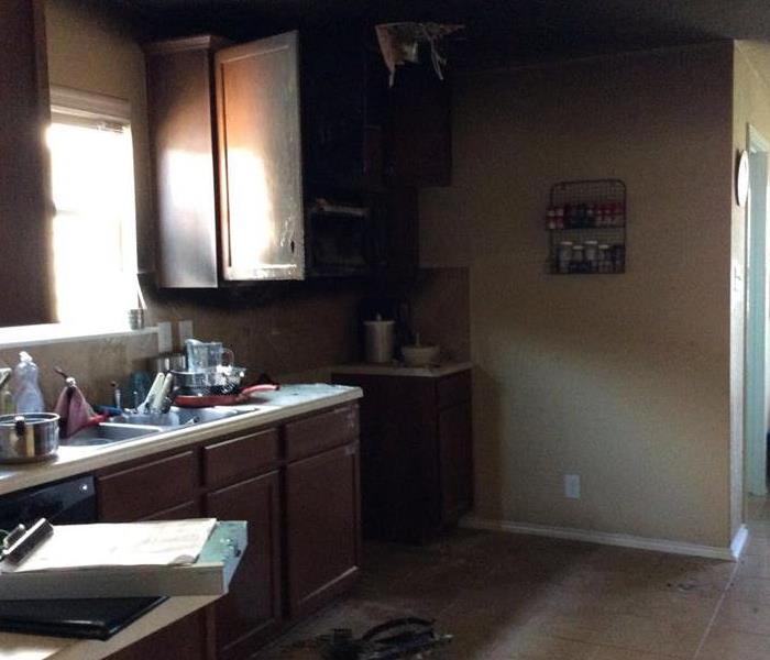 soot covered kitchen from fire damage