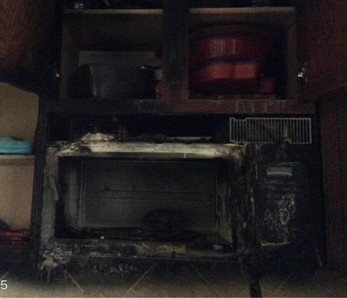 soot covered kitchen from fire damage