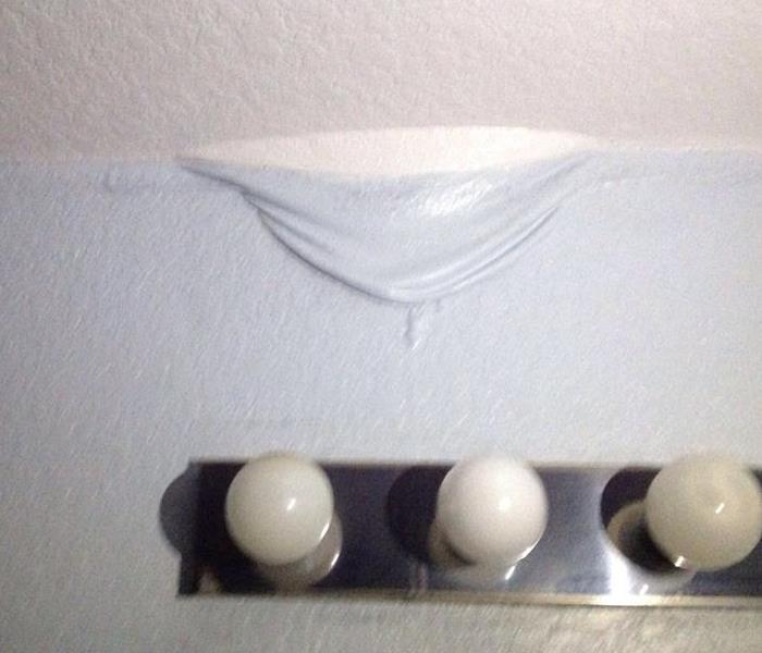 Water on ceiling in bathroom